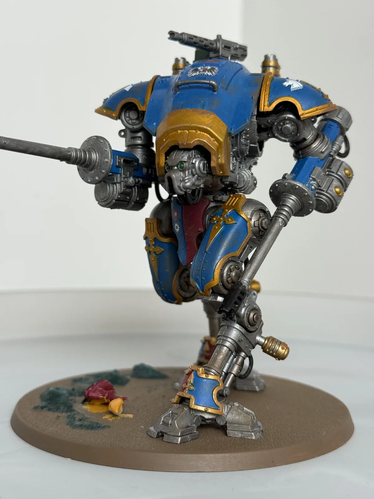 Commissioned Imperial Knight in blue and gold, striding pose, three-quarter view